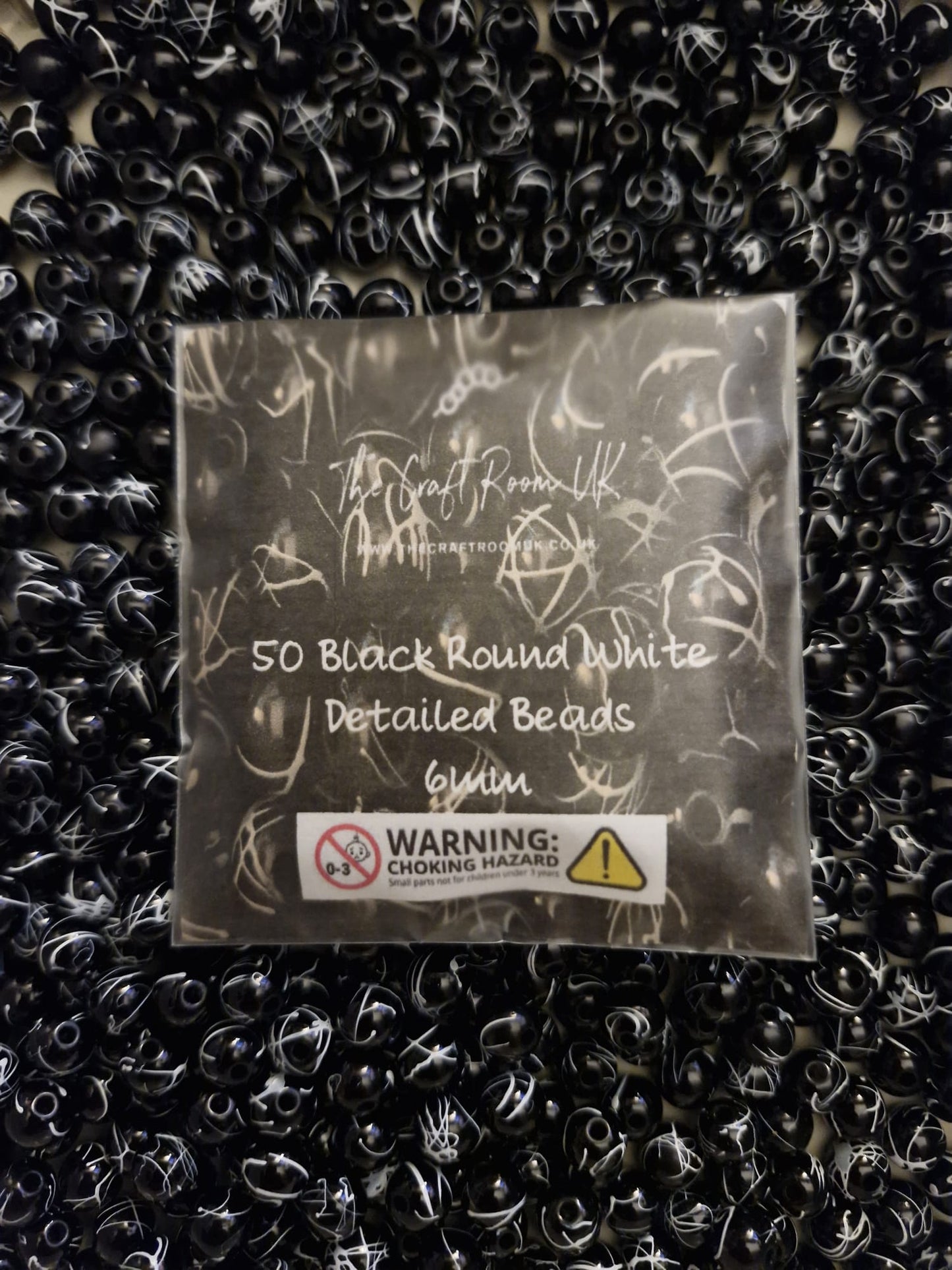 Black Round White Detailed Beads