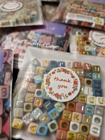 Rose Coloured Cube Alphabet Beads